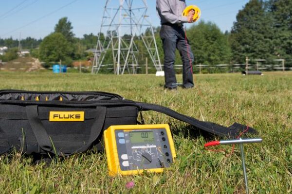 Key features Stakeless Testing The Fluke 1623-2 earth ground tester is able to measure earth ground loop resistances using only clamps. With this test method, two clamps are placed around the earth ground rod and each are connected to the tester. No earth ground stakes are used at all. A known, fixed voltage is induced by one clamp and the current is measured using the second clamp. Then the tester automatically determines the resistance of the earth ground rod. This test method only works if a bonded earth ground system exists for the building or structure under test, but most are. If there is only one path to ground, like at many residential applications, the Stakeless method will not provide an acceptable value and the Fall-of-Potential test method must be used. With Stakeless testing, the earth ground rod does not need to be disconnected - leaving the bonded earth ground system intact during test. Gone are the days of spending time placing and connecting stakes for each earth ground rod on your system - a major time saver. You can also perform earth ground tests in places you’ve not considered before: inside buildings, power pylons, or anywhere you don’t have access to soil. The Most Complete Tester The Fluke 1623-2 is a unique earth ground tester that can perform all four types of earth ground measurement. 3- and 4-Pole Fall-of-Potential (using stakes) 4-Pole Soil Resistivity Testing (using stakes) Selective Testing (using 1 clamp and stakes) Stakeless Testing (using 2 clamps only)
